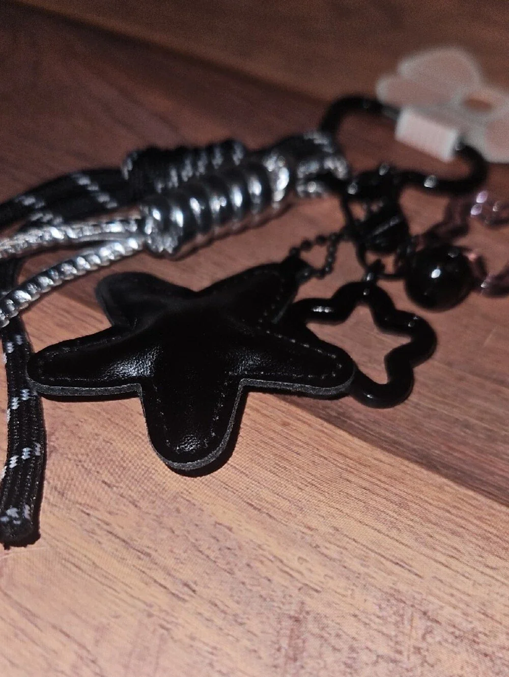 Black Star Charm Keychain with Metallic Accents